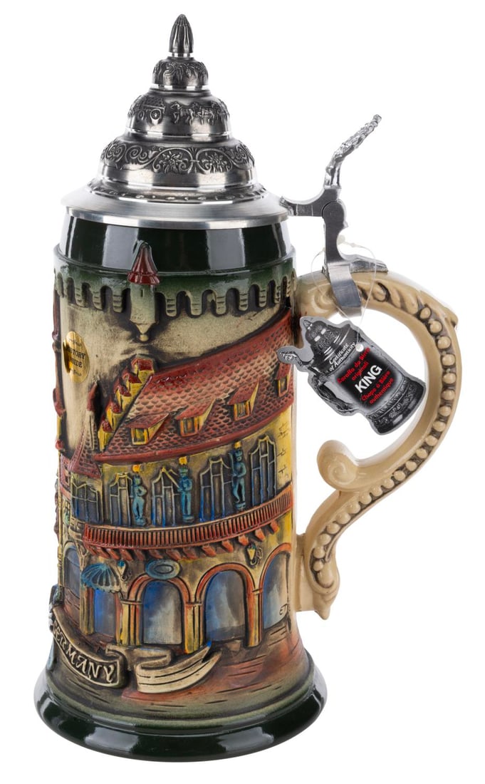 An Epcot Germany Limited Edition Stein.: (KING-WERK, 2013) A relief stein featuring Germany and the Epcot logo, created by master modeler Mrs. Eva Trees and sold exclusively at the nation's World Showcase Pavilion. Measuring 11.5" tall and