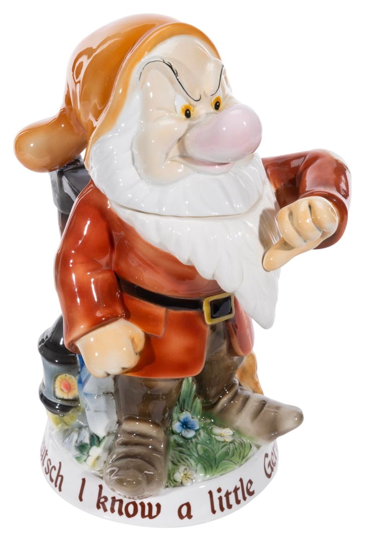 An Epcot Germany Pavilion Grumpy Stein.: (Walt Disney World, 2014) A limited edition figural stein of Grumpy with "I know a little German" on the base, released at the World Showcase Germany Pavilion in Epcot. Measuring 11" tall and 5.5" in