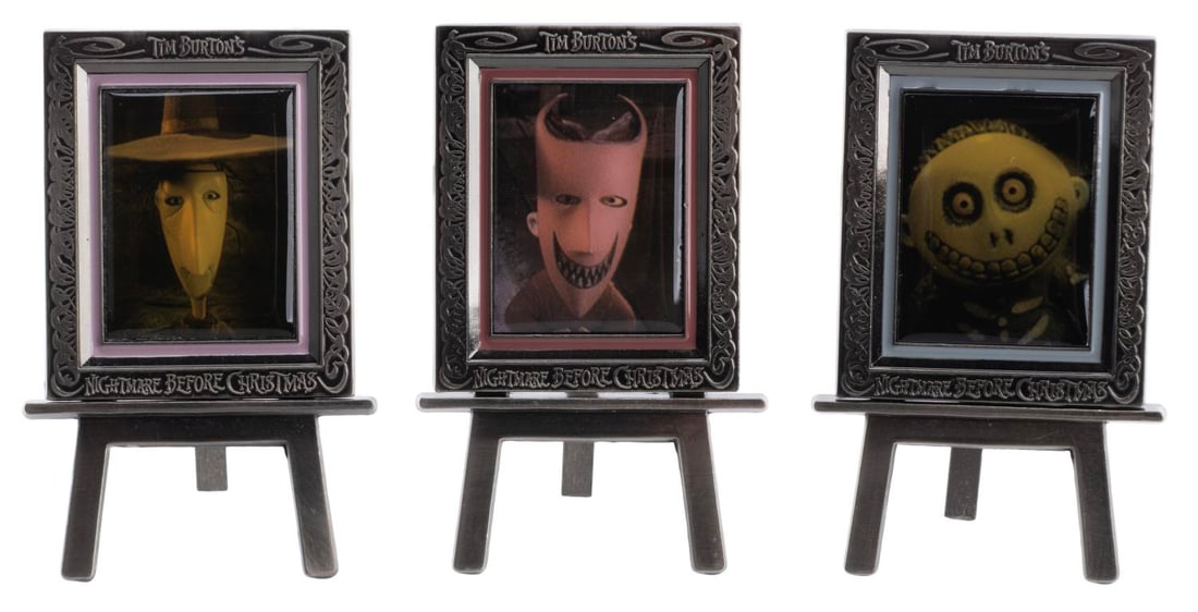 A "The Nightmare Before Christmas" Easel Pin Set.: (Disney, 2004) A Disney Catalog-exclusive "The Nightmare Before Christmas" easel pin set of Lock, Shock, and Barrel. Released in a limited edition of 1500, the three pins are in very good condition