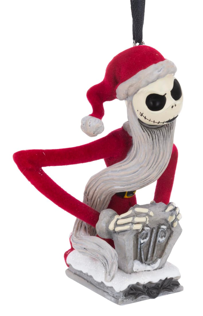 A Santa Jack Skellington Sketchbook Christmas Ornament.: (Disney, 2020s) A Sketchbook Christmas ornament featuring Jack Skellington dressed as Santa Claus from "The Nightmare Before Christmas." Measuring 1.75" x 3" x 3.75" tall, the ornament is in fine cond