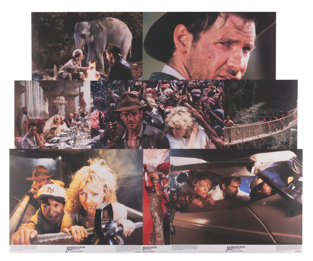 A Set of "Indiana Jones and the Temple of Doom" Lobby Cards.: (Paramount, 1984) A complete set of eight lobby cards for "Indiana Jones and the Temple of Doom." Measuring 11" x 14" each, the lobby cards are in very good to fine condition with light creases and