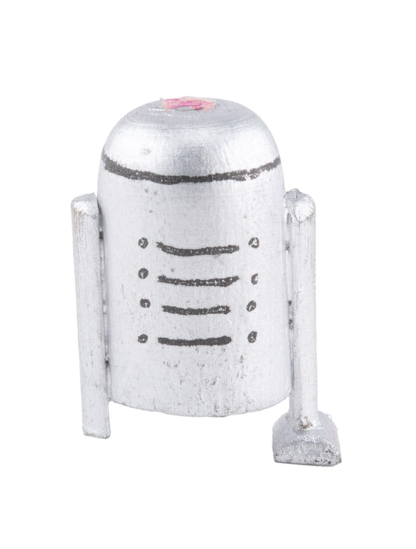 A "Ghostbusters" R2-D2 Miniature Easter Egg Prop.: (Columbia, 1984) A hand-painted wooden miniature R2-D2 from the production of "Ghostbusters." A few Easter eggs were hidden by the production team in the miniature version of Dana's apartment
