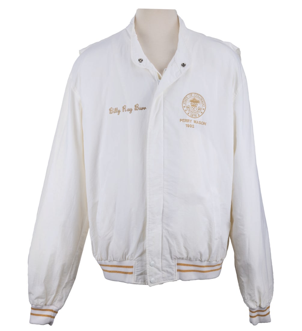 Raymond Burr's "Perry Mason" TV Film Crew Jacket.: (NBC, 1992) Raymond Burr's crew jacket from the "Perry Mason" television film "The Case of the Reckless Romeo." The cream jacket features the Colorado seal embroidered on one side and "Billy Ray