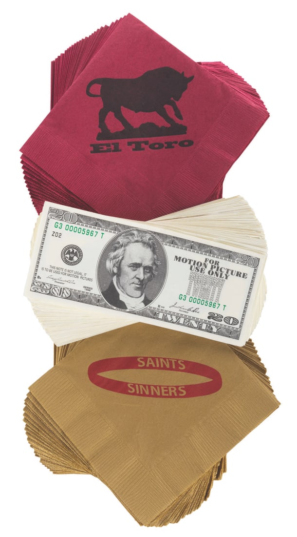 A "The Punisher" Prop Collection.: (Lions Gate, 2004) A collection of props from the Marvel film "The Punisher" starring Thomas Jane and John Travolta. Included are a stack of 64 $20 bills, 30 prop napkins from the Toro Casino, and 30