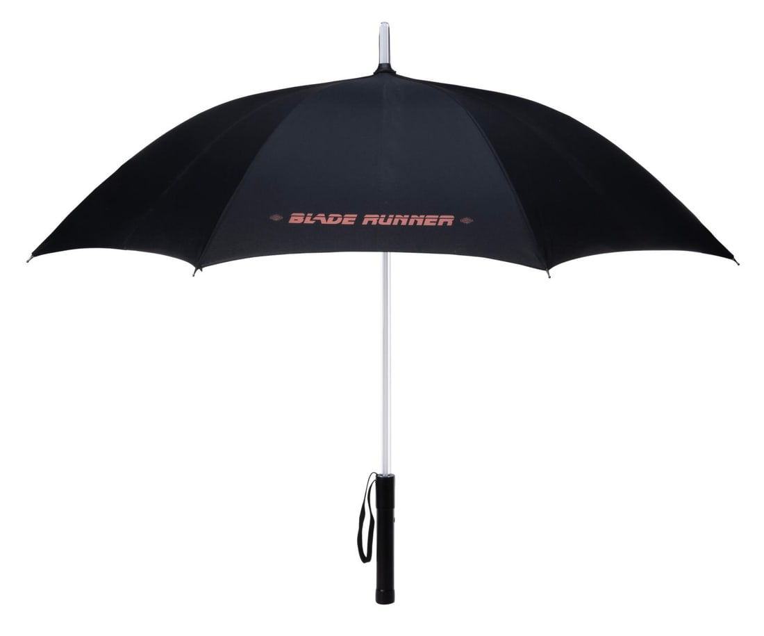 A "Blade Runner" Light-Up Umbrella.: (Warner Bros., 2007) A "Blade Runner" branded light-up umbrella, similar to those seen in the classic sci-fi film. These umbrellas were gifted to attendees at an after-party for the Blu-ray release