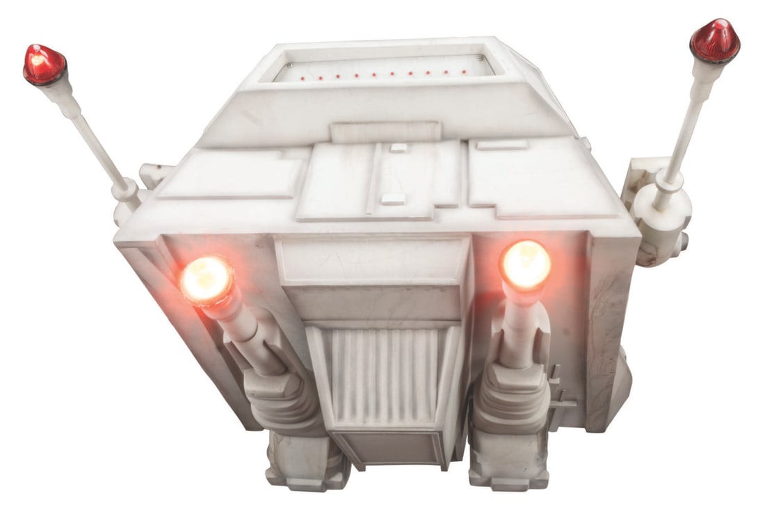 An FAO Schwarz "Star Wars" Store Display AT-AT Walker Head.: Please add the special shipping required line to the description.(FAO Schwarz, 1990s-2000s) An AT-AT walker head from an FAO Schwarz Chicago "Star Wars" store display. Included in the lot are four