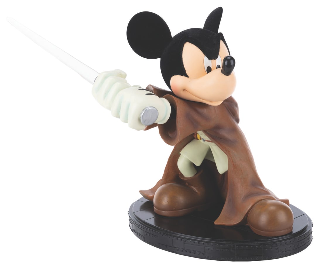 A Jedi Mickey Medium Figurine.: (Walt Disney World, 2012) A Jedi Mickey Medium Fig designed by Disney artist Brian Blackmore, released exclusively at Walt Disney World's Star Wars Weekends in 2012. The lightsaber's light-up effect w