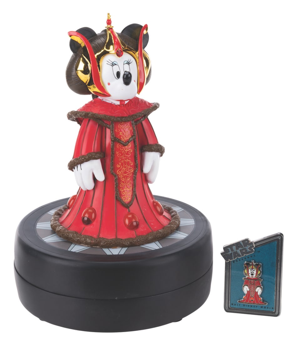 A Minnie Mouse as Queen Amidala Medium Fig with Pin.: (Walt Disney World, 2013) A Medium Fig of Minnie Mouse dressed as Queen Amidala from "Star Wars: Episode I - The Phantom Menace," designed by Disney artist Costa Alavezos. The figurine, released in a