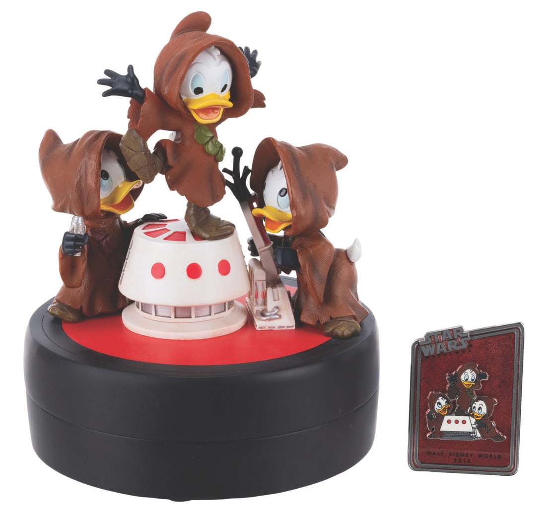 A Star Wars Huey, Dewey, and Louie Medium Fig with Pin.: (Walt Disney World, 2015) A Medium Fig of Huey, Dewey, and Louie as Jawas. Designed by Mike Sullivan, the figurine was released in a limited edition of 1977 exclusively at the 2015 Star Wars Weekends