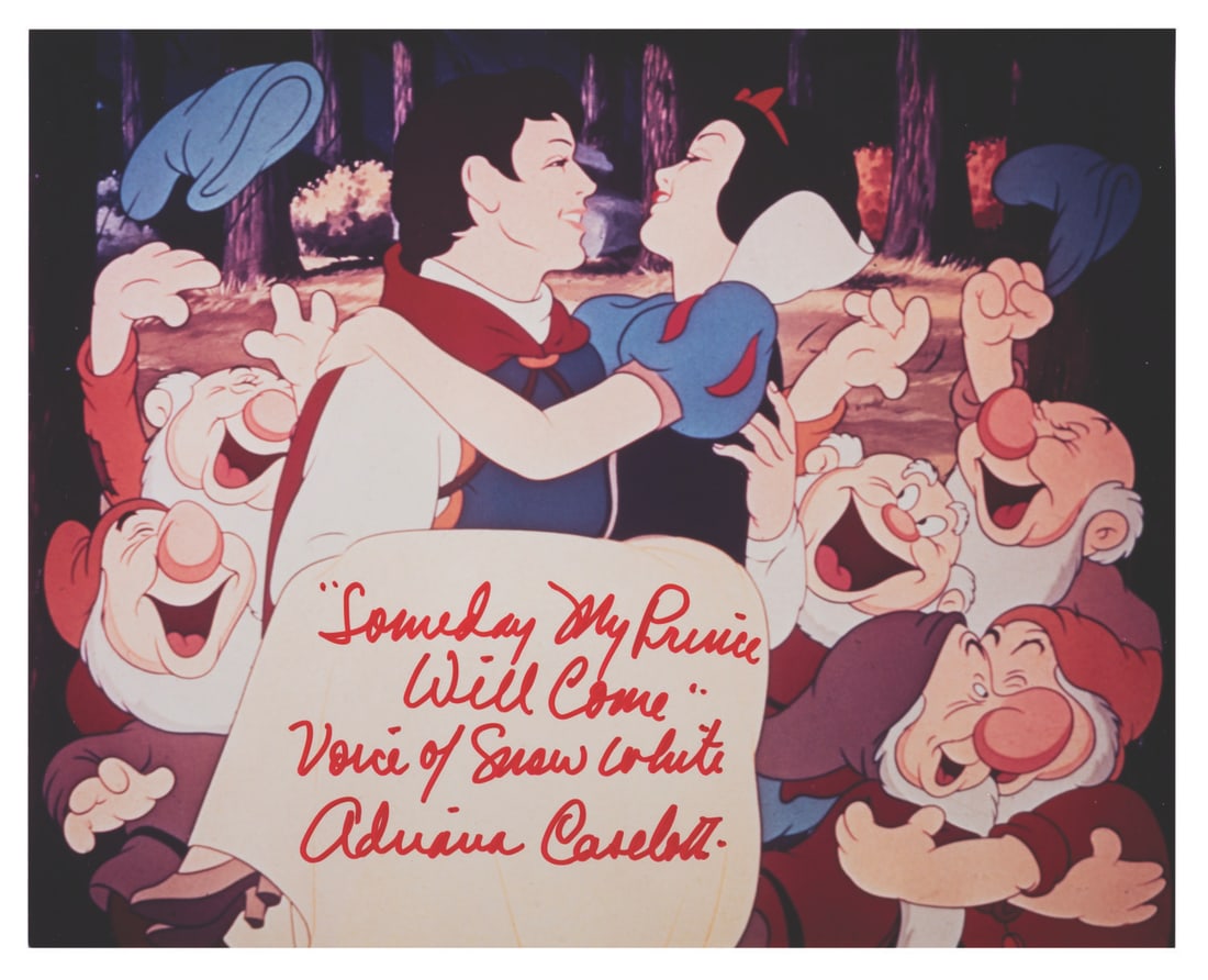 An Adriana Caselotti Signed Snow White Photo.: (Disney, 1990s) A photograph from "Snow White and the Seven Dwarfs" signed by Adriana Caselotti, the voice of Snow White. Measuring 8" x 10", the autographed photo is in fine condition.