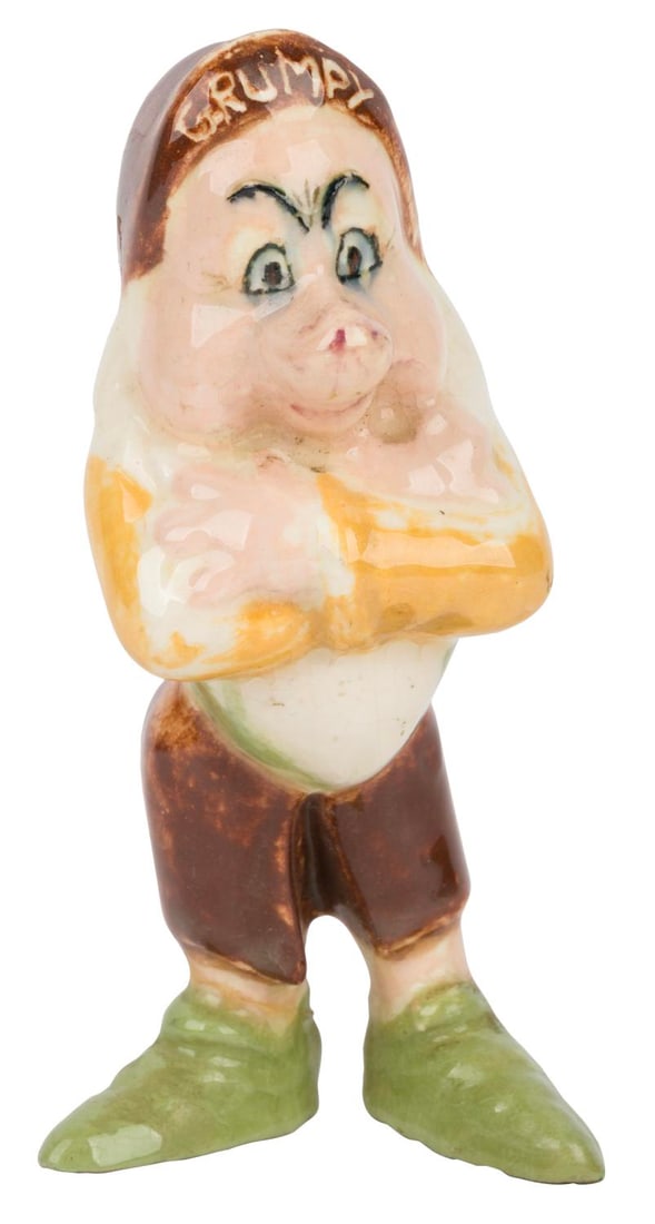 A Grumpy Ceramic Figure. (1 of 3)