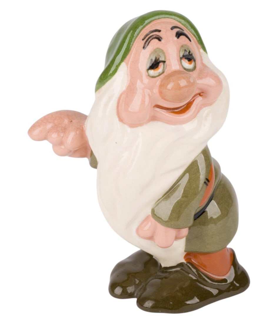 A "Snow White" Sleepy Ceramic Figurine by Shaw.: (Shaw, 1946) A painted and glazed ceramic figurine of Sleepy from "Snow White and the Seven Dwarfs" manufactured by Evan K. Shaw. Measuring 3" x 3.5" and 5.5" tall, the figurine is in very good condit
