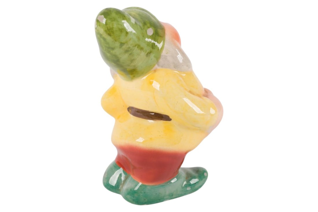 A Rare Bashful Figurine by Zaccagnini.: (Zaccagnini, 1947) An extremely rare Happy figurine by Zaccagnini Italia, inspired by "Snow White and the Seven Dwarfs." The hand-painted ceramic figure was designed by sculptor Mario Bandini and prod