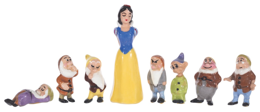 A "Snow White and the Seven Dwarfs" Hagen-Renaker Figure Set.: (Hagen-Renaker, 1950s-60s) A set of "Snow White and the Seven Dwarfs" mini figurines manufactured by Hagen-Renaker, an original supplier of souvenirs for Disneyland. Many of the Dwarfs in this set are