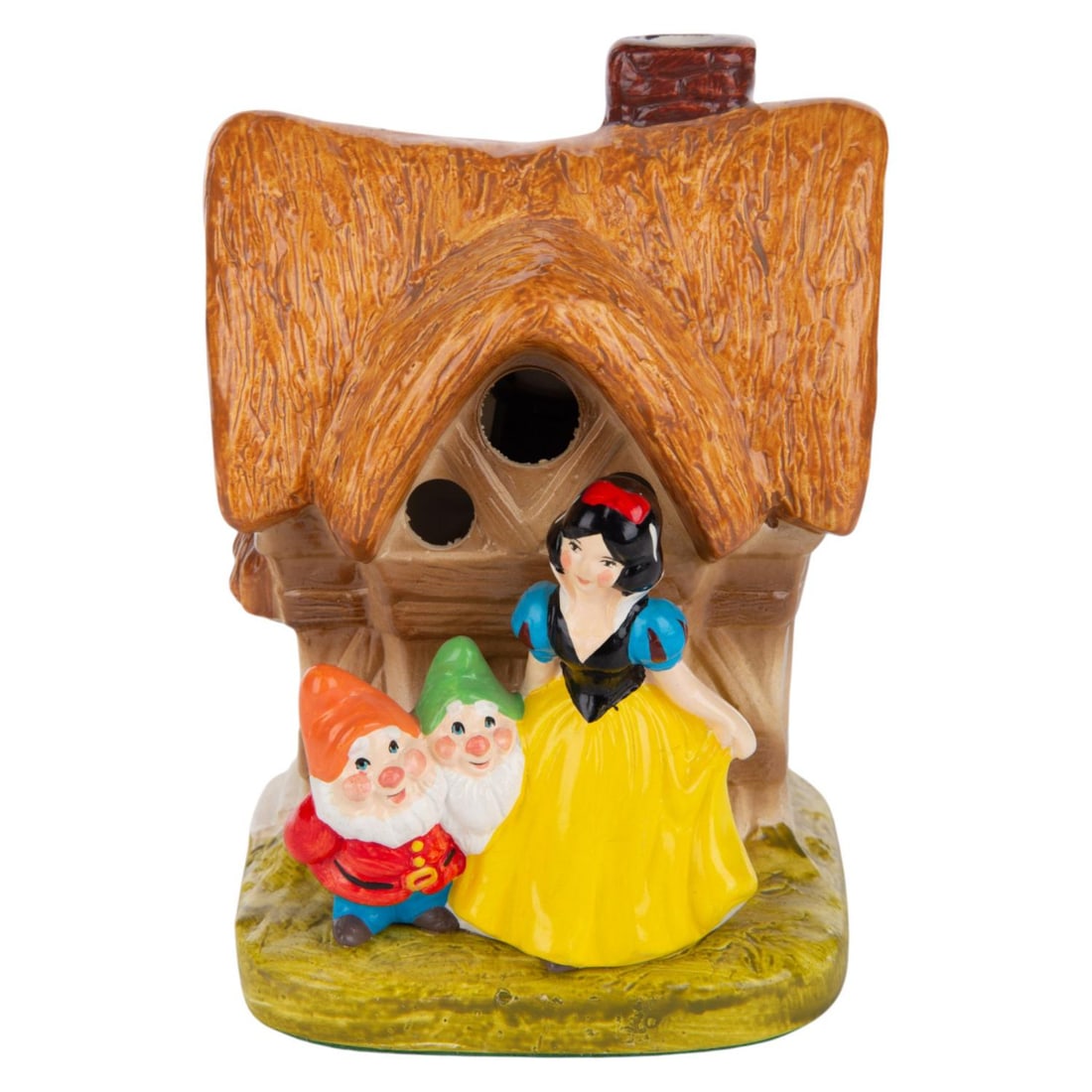 A "Snow White" Ceramic Night Light Lamp.: (Disney, 1960s-70s) A ceramic night light lamp inspired by "Snow White and the Seven Dwarfs." Measuring 4" x 4.75" and 5.75" tall, the lamp is in good condition with the bottom foam cracked and fallin