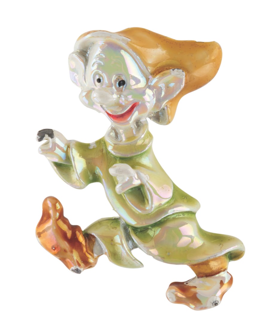 A Glossy Dopey Pin.: (Disney, 1950s-70s) A rare Dopey pin with a glossy finish. The "Snow White and the Seven Dwarfs" pin displays in very good condition with chipping, paint loss, and wear.