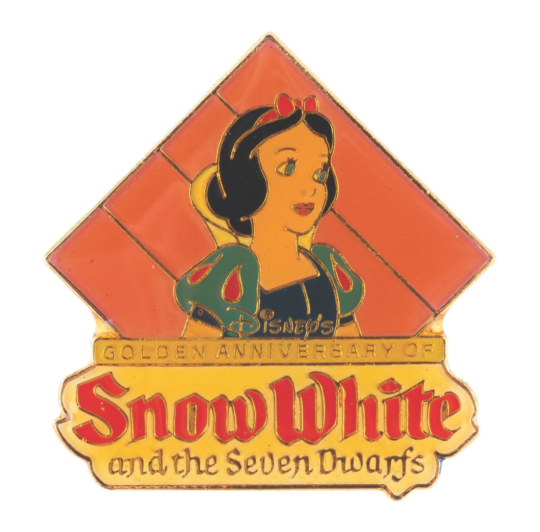 A "Snow White and the Seven Dwarfs" Golden Anniversary Pin.: (Disney, 1987) A rare orange background "Snow White and the Seven Dwarfs" pin commemorating the golden 50th anniversary of the groundbreaking film. The pin is in very good condition with color fading