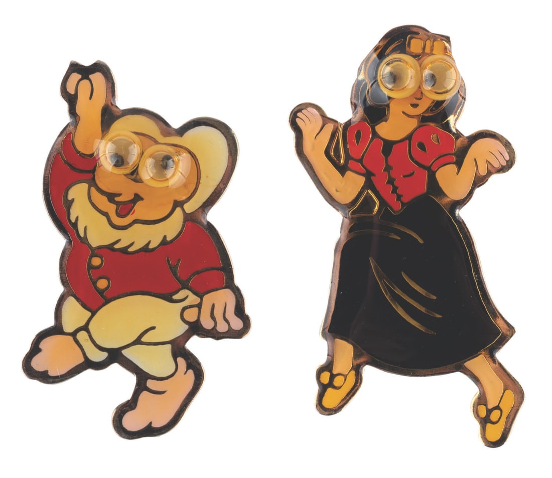 A Pair of "Snow White and the Seven Dwarfs" Googly-Eyed Pins.: (1970s-80s) A pair of googly-eyed pins of Snow White and Doc from "Snow White and the Seven Dwarfs." The pins are in very good condition, with color shift from age and light wear.