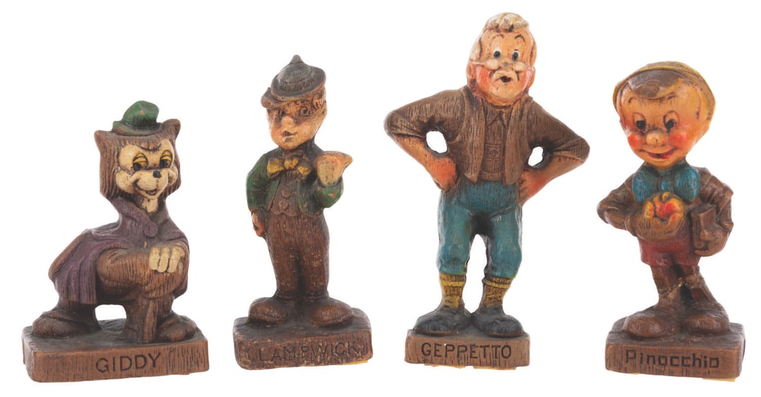 Medium "Pinocchio" Figurines by Multi Products of Chicago.: (Multi Products, 1940) Four "Pinocchio" figurines made of Syroco faux-wood resin. Included are Pinocchio, Geppetto, Lampwick, and Gideon. Standing 3.5" to 4" tall, the figurines are in very good condi