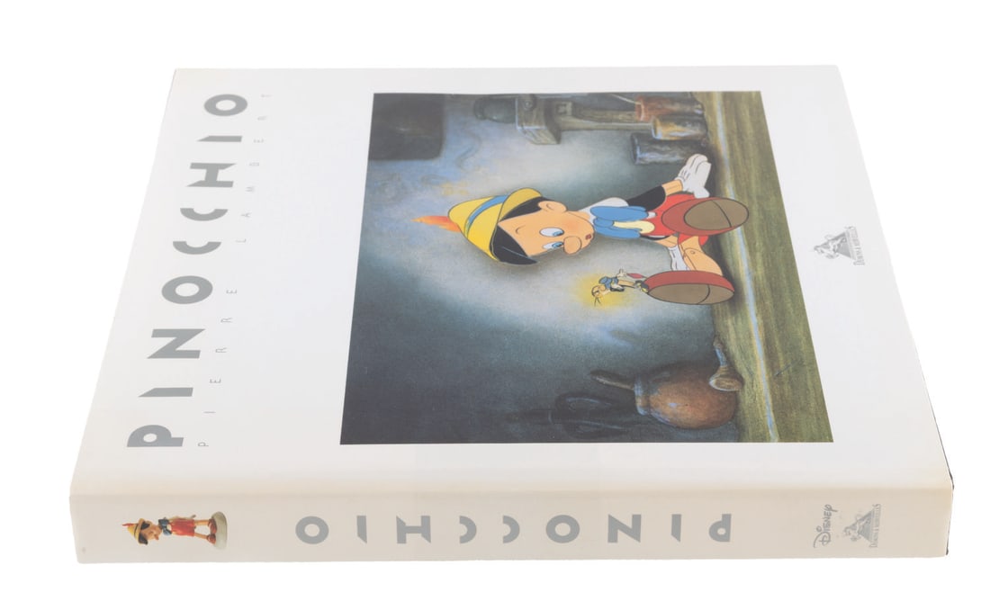 A French "Pinocchio" Art Book.: (Demons & Merveilles, 1995) A first-edition French-language "Pinocchio" book featuring the art and production process of Walt Disney's classic film. The 235-page hardcover tome by Pierre Lambert inclu