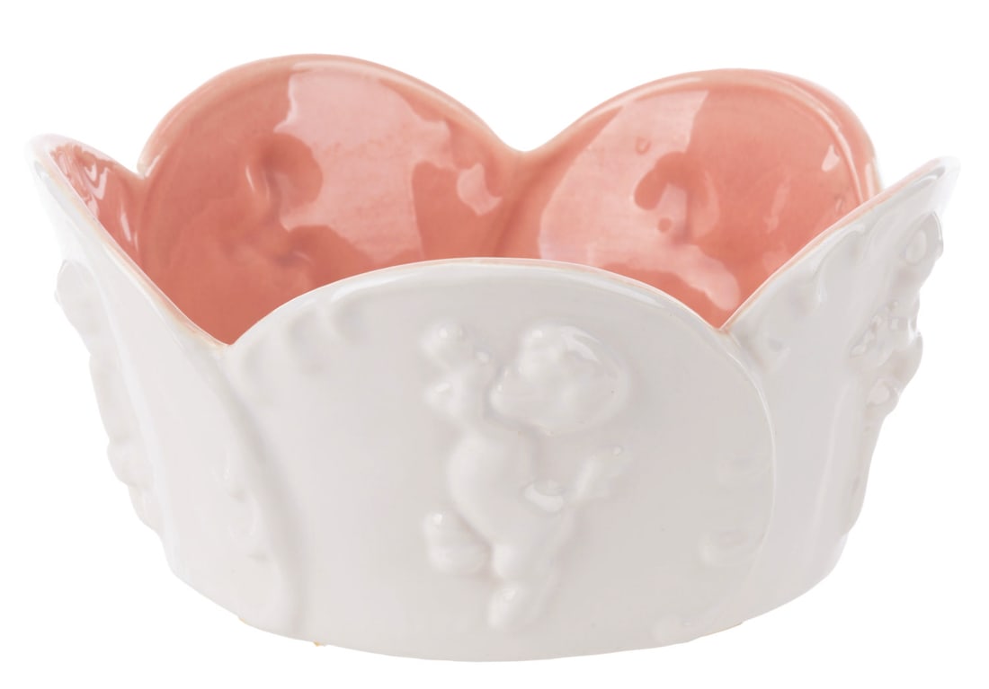 A "Fantasia" Ceramic Satyr Bowl.: (Vernon Kilns, 1940) A solid white ceramic Satyr Bowl, inspired by the Pastoral Symphony sequence of "Fantasia." Measuring 7" in diameter x 3.25" tall, the bowl displays in very good condition, with a