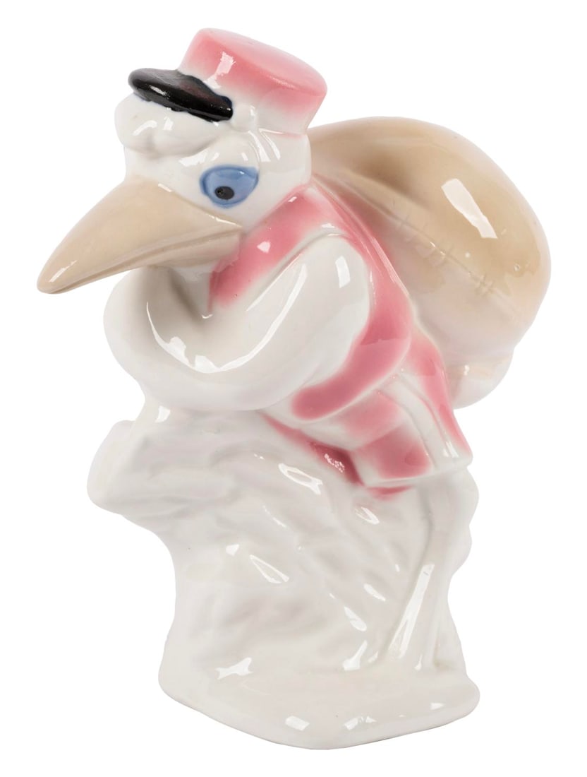 A "Dumbo" Mr. Stork Ceramic Figurine from Spain.: (Disney, 1950s-60s) A ceramic figurine of Mr. Stork from "Dumbo," stamped "Cig?ena" (stork) and likely manufactured in Spain. Measuring 2.5" x 5" and 6" tall, the figurine is in very good condition