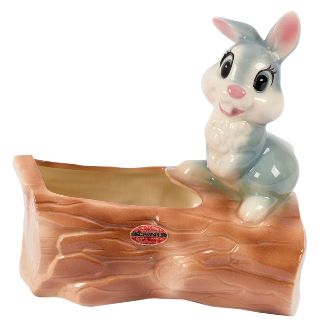 A Large "Bambi" Thumper Ceramic Planter.: (Shaw, 1940s-50s) A ceramic planter of Thumper from "Bambi," manufactured by renowned ceramist Evan K. Shaw. Measuring 7.25" x 4.5" and 7.75" tall, the figurine is in good condition with crazing in
