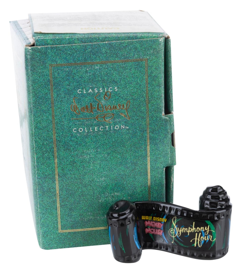 A WDCC "Symphony Hour" Title Scroll.: (WDCC, 1993-97) A Walt Disney Classics Collection ceramic opening title scroll for the Mickey Mouse short "Symphony Hour." Measuring 2" x 3.25", the item is in fine condition.