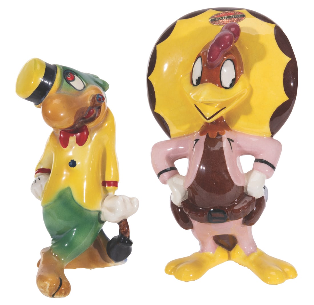 A Pair of Jose Carioca and Panchito Pistoles Ceramic Figurines.: (Shaw, 1940s-50s) A pair of ceramic figurines of Jose Carioca and Panchito Pistoles from "Saludos Amigos" and "The Three Caballeros," by Evan K. Shaw. Ranging in size from 5.75" to 6.75" tall, the