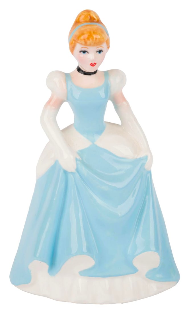 A Ceramic "Cinderella" Figurine.: (Disney, 1980s-90s) A ceramic figurine of "Cinderella." Standing 5.5" tall, the figurine is in very good condition.