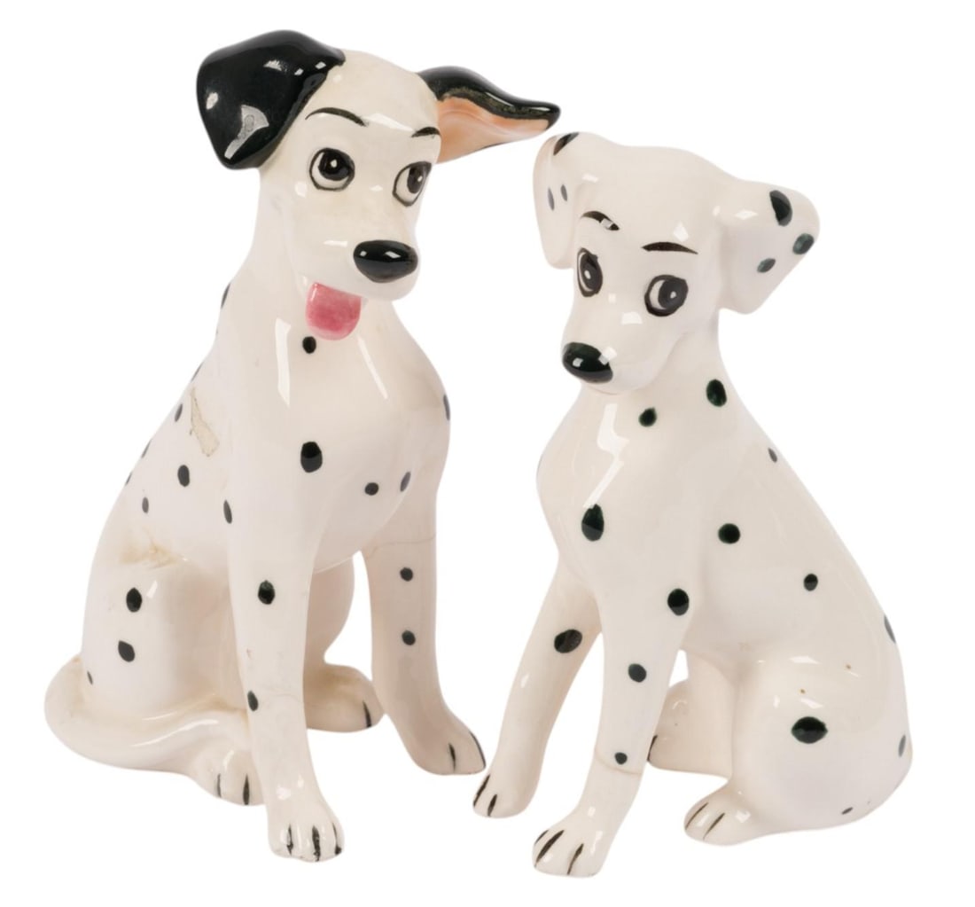"One Hundred and One Dalmatians" Pongo and Perdita Ceramic Figurines.: (Enesco, 1960s-70s) A ceramic figurine pair of Perdita and Pongo from "One Hundred and One Dalmatians." Measuring 2.75" x 2" and 4.75" approximately each, the figurines display in good condition,