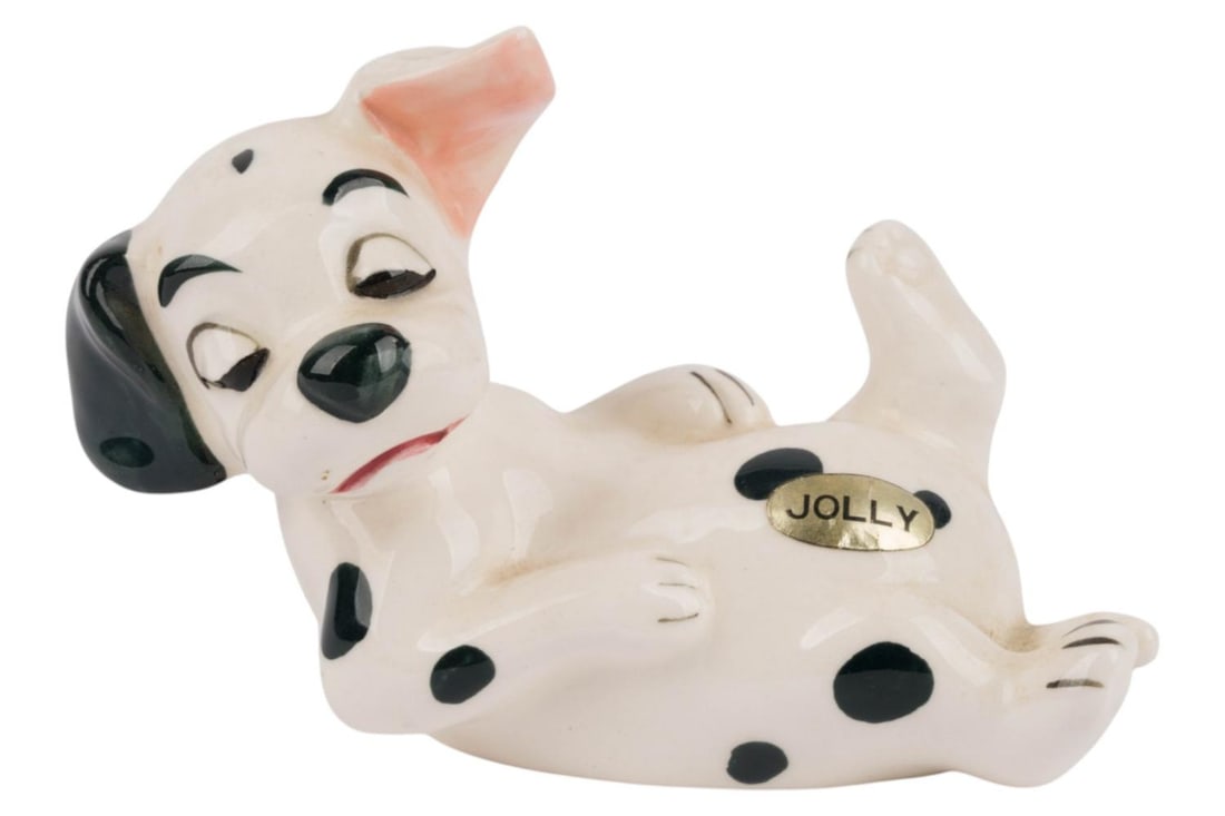 A "One Hundred and One Dalmatians" Jolly Figurine.: (Enesco, 1960s-70s) A ceramic figurine of puppy Jolly from "One Hundred and One Dalmatians," likely sold at one of the Disney Parks. Measuring 5" x 2.25" x 3.5" tall, the figurine is in very good