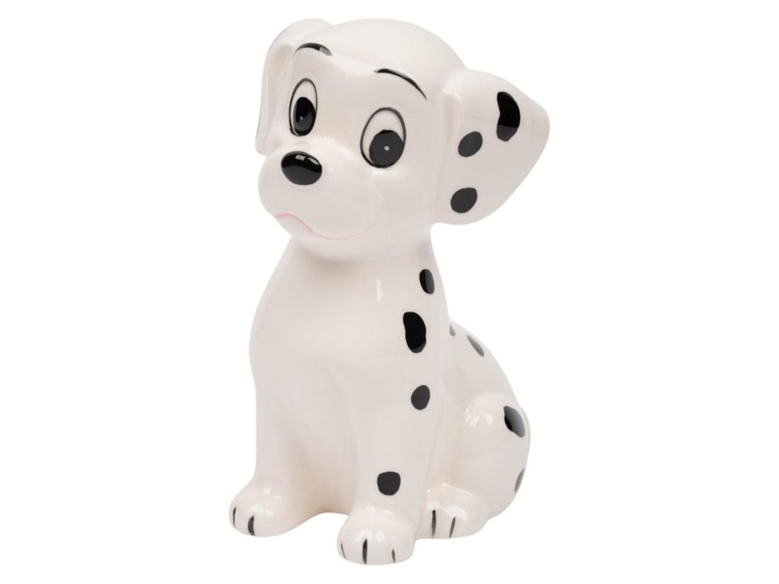 A "One Hundred and One Dalmatians" Ceramic Puppy Bank.: (Enesco, 1970s-80s) A ceramic puppy bank from "One Hundred and One Dalmatians." Measuring 3.75" x 5" and 6.75" tall, the bank is in very good condition with very light wear.