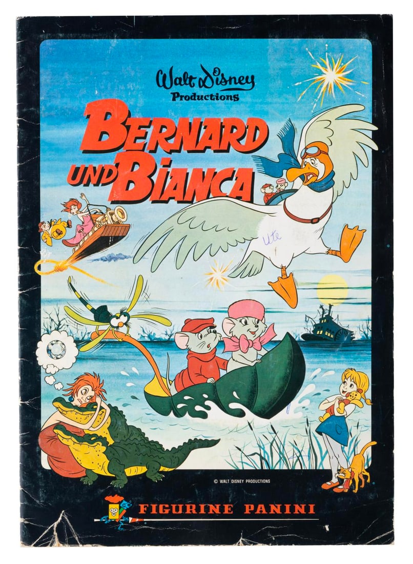 A Complete "The Rescuers" German Panini Sticker Book.: (Panini, 1977) A German-language Panini sticker book for "The Rescuers" filled with all 360 stickers in the set. Measuring 9.5" x 13.5", the book is in fair condition with wear, creases, and a 1"