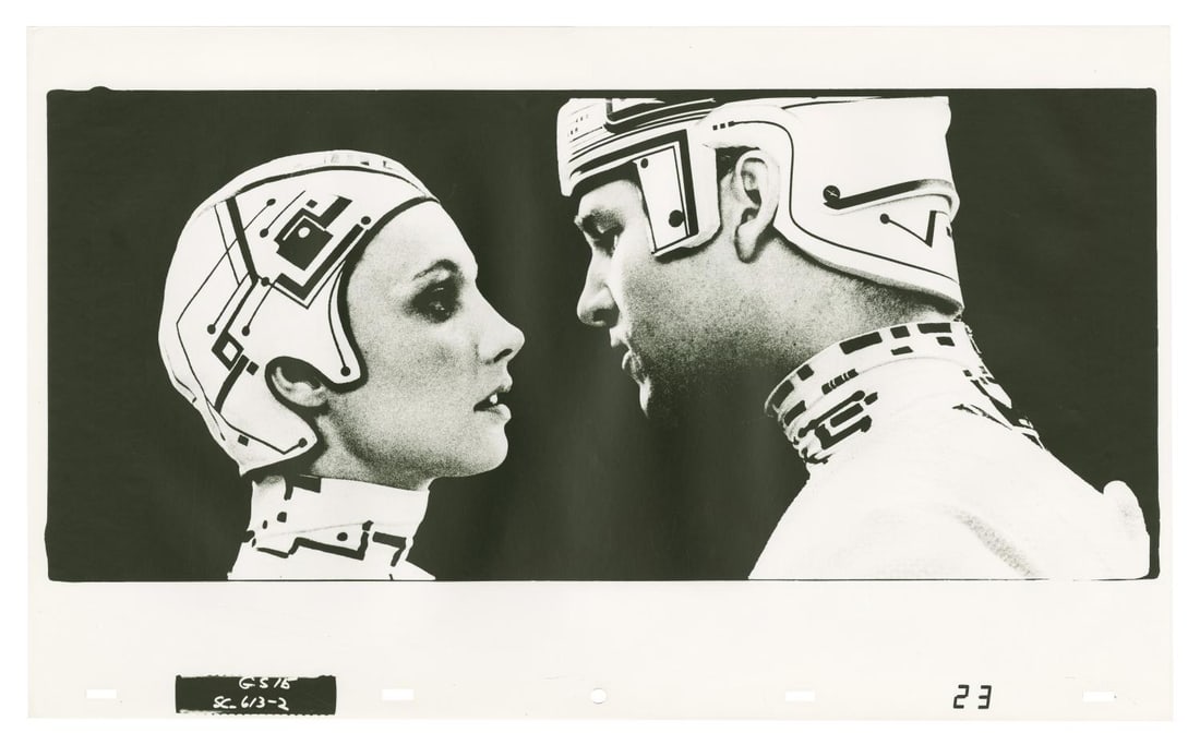 A "Tron" Photostat Effect Print.: (Disney, 1982) A photostat print of a romantic moment between Flynn and Yuri from "Tron." The photostat was created at the Studio and used during the production of the special effects sequences in