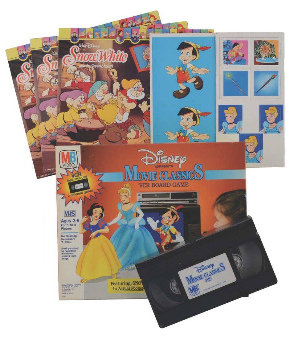 A Disney Movie Classics VCR Board Game.: (Milton Bradley, 1986) A Disney Presents Movie Classic VCR Board Game featuring Snow White, Cinderella, and Pinocchio. The game requires a VCR to play and is being sold as untested and may require