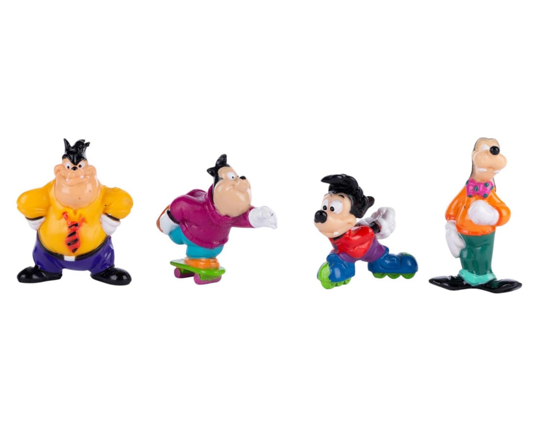 A Set of Mail-In Goof Troop Figurines.: (Disney, 1990s) A collection of four mail-in "Goof Troop" plastic figurines, including Goofy, Max, Pete, and PJ. Measuring 0.5" x 2" and 2" tall, the figurines are in good condition with minor