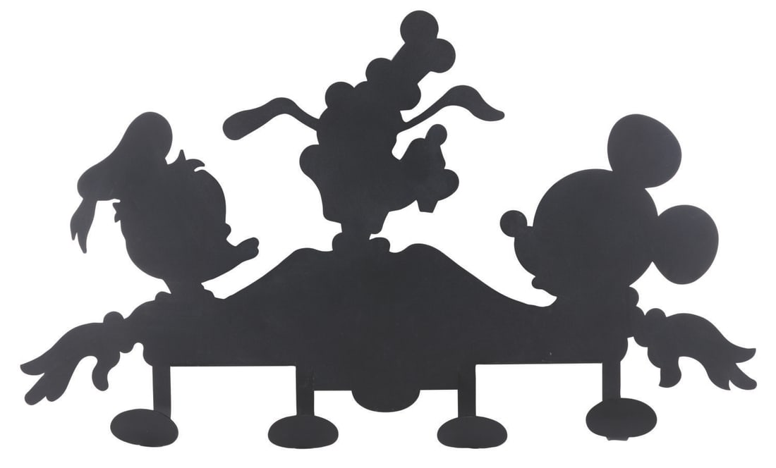 A Mickey, Goofy, and Donald Duck Coat Rack.: (Disney, 2000s) A coat rack featuring the silhouettes of Mickey Mouse, Goofy, and Donald Duck. Measuring 29" x 4" x 17" tall, the metal coat rack is in very good condition with scratches and light