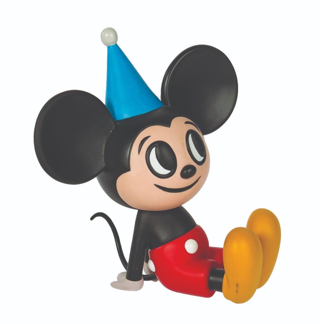 A Mickey Mouse Modern Pets Vinyl Figure.: (Medicom, 2006) A Mickey Mouse vinyl figure from the Modern Pets line by Japanese toy maker Medicom. The seated Mickey figure was designed by artist Moto Ken and includes the original box. Measuring 5
