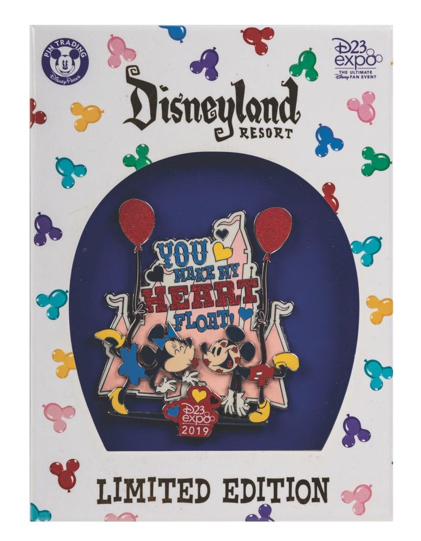 D23 Expo 2019 Limited Edition Large Pin.: (Disney, 2019) A limited edition 500 Jumbo pin of Mickey and Minnie Mouse from the 2019 D23 Expo. Mickey is covered with kisses, suspended with Minnie by balloons in front of the castle with "You
