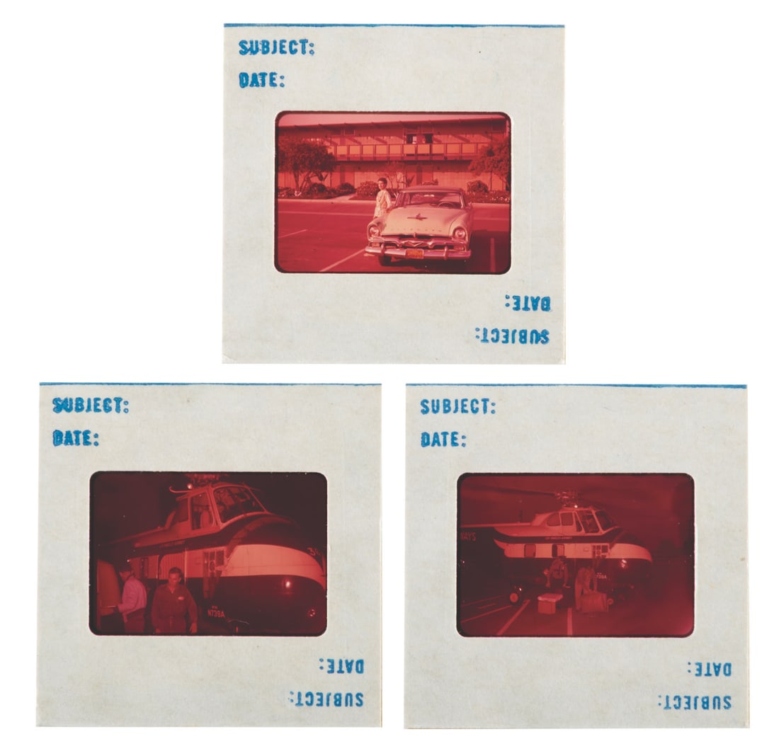 Disneyland Helicopter Slides.: (Disneyland, 1960s) Three rare slides relating to the Disneyland Heliport: two of the helicopter and one of the nearby parking lot. In the early days of the Park, the helicopter would fly Guests