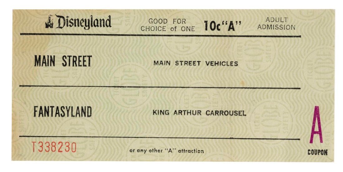 A Disneyland Adult Admission "A" Ticket.: (Disneyland, 1970s) An Adult admission "A" ticket from the early 1970s, with only Main Street Vehicles and King Arthur Carrousel listed. Measuring 2.5" x 5.5", the ticket is in good condition with a