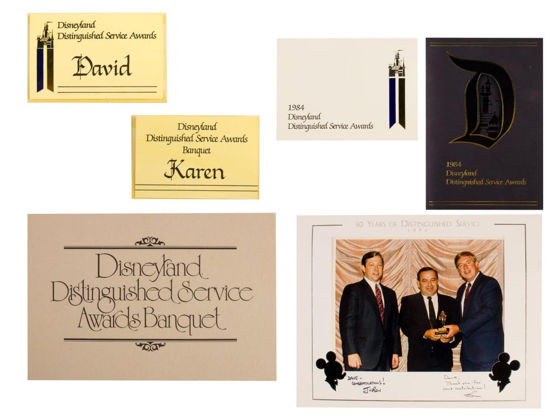 A Cast Member "Distinguished Service Awards" Collection.: (Disneyland, 1979-94) A collection of 6 Disneyland Cast Member "Distinguished Service Awards" items. Included are items from Disneyland Maintenance employee David Hauenstein's long career with the