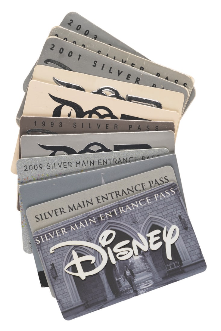 A Collection of Disney Parks Silver Passes.: (Disneyland/ Walt Disney World, 1982-2010) A collection of 11 Disney Silver Passes. A benefit of working for the Walt Disney Company, the pass gives Cast Members admission to any Disney Park (except