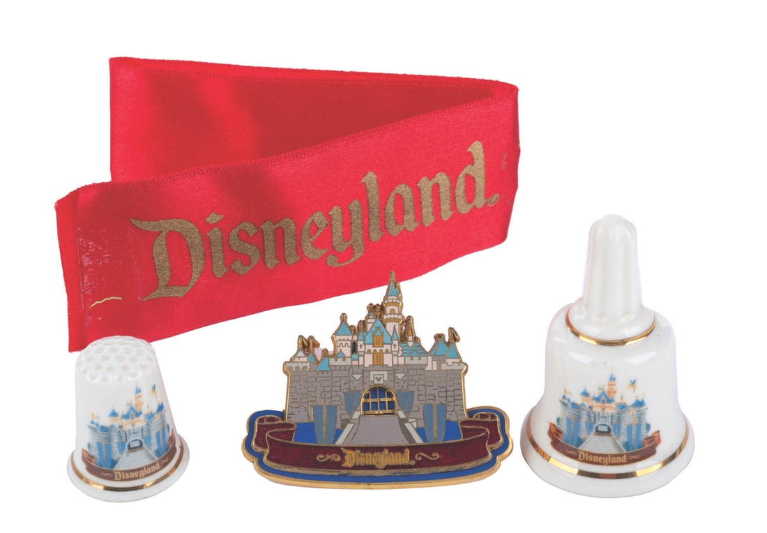 A Disneyland Pin, Bell, Thimble, and Ribbon. (1 of 1)