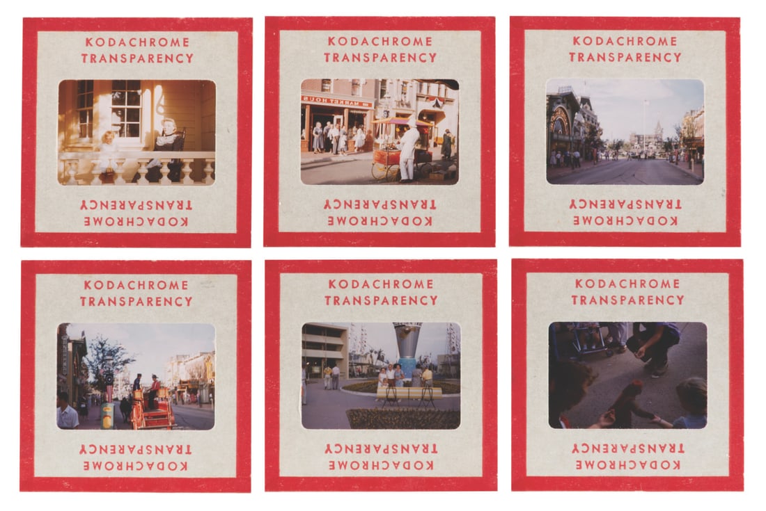 A Collection of Early Main Street, U.S.A. Slides.: (Disneyland, 1960s) A collection of six early Kodachrome transparency slides of Disneyland's Main Street, U.S.A. shops, and the Clock of the World. Measuring 2" x 2" each, the slides are in very good