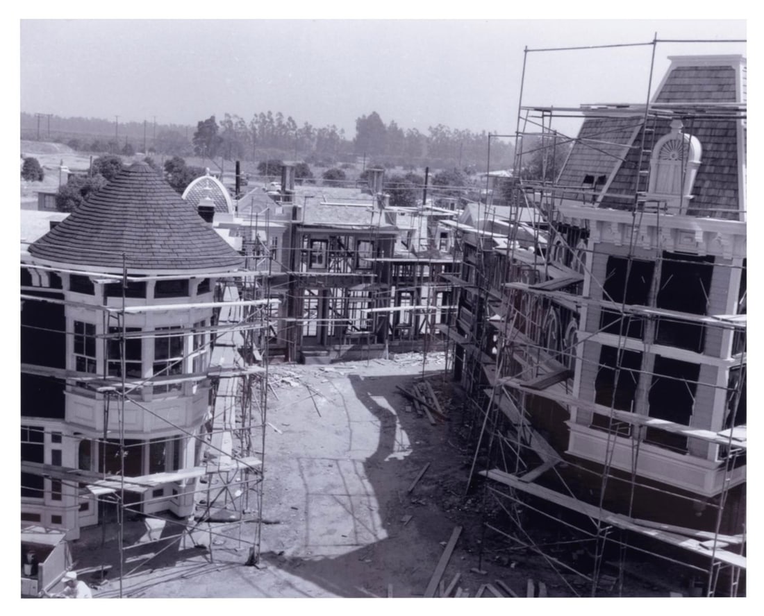 A Main Street, U.S.A. Construction Photo Reprint.: (Disneyland, 1955) A Disneyland construction photo showing the Flower Market section of Main Street. This print was likely made in the 1990s. Measuring 8" x 10" the photo is in fine condition.
