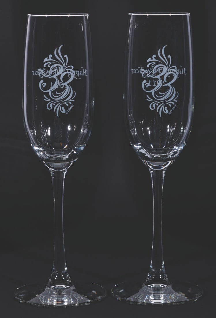 A Pair of Club 33 New Year's Eve 2011 Champagne Flutes. (1 of 2)