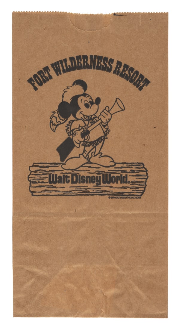 A Fort Wilderness Resort Paper Shopping Bag.: (Disney's Fort Wilderness Resort, 1980) A paper bag featuring Frontier Mickey from a souvenir shop at Disney's Fort Wilderness Resort. Included is a receipt for a soda and a souvenir, purchased in Dec