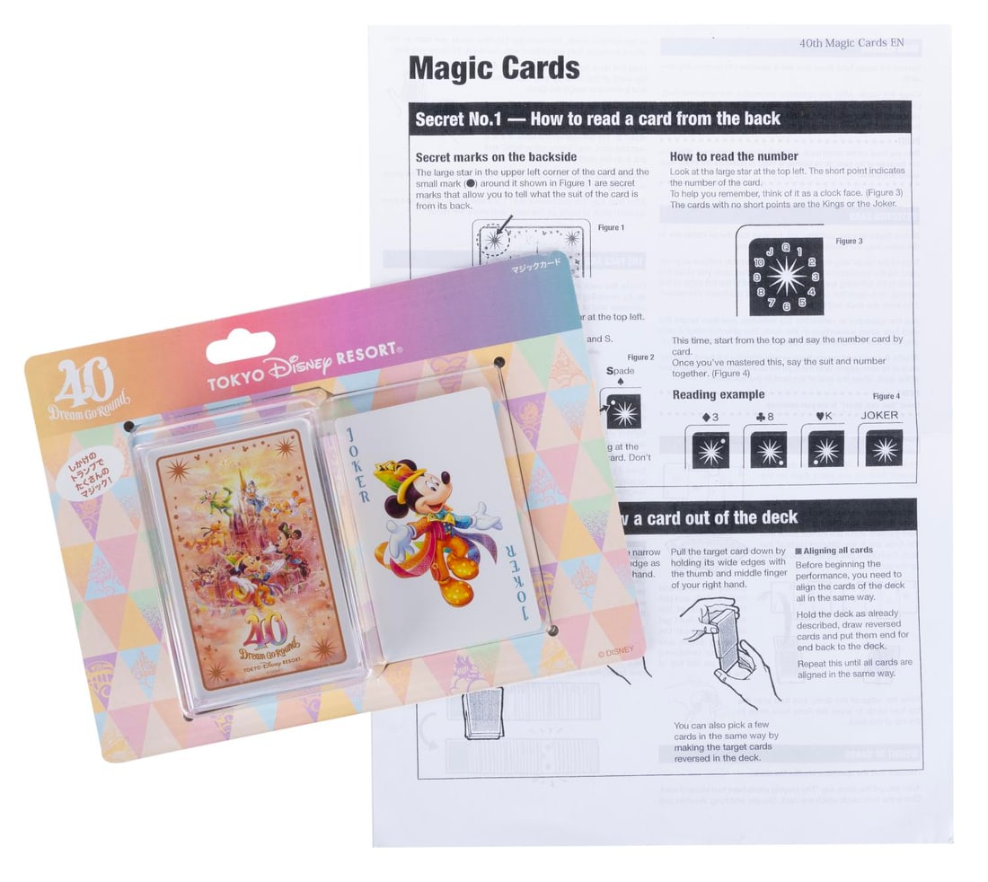 A Set of Tokyo Disney 40th Anniversary Magic Cards.: (Tokyo Disney, 2023-24) A set of Tokyo Disney 40th Anniversary Dream-Go-Round magic playing cards. Included is a page of English instructions on how to use the cards for a variety of tricks. Measuring